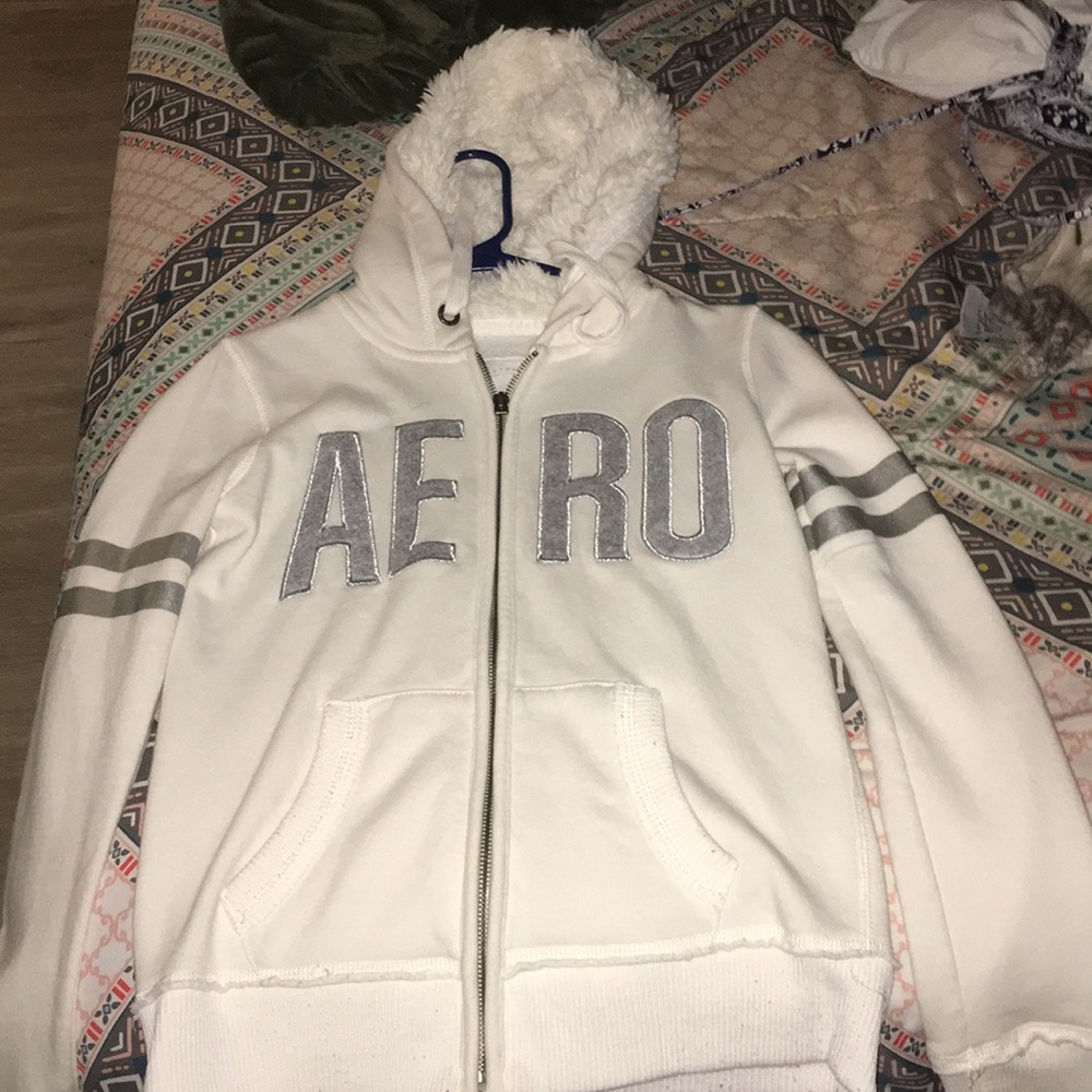 A white Aeropostale jacket with a fluffy hood